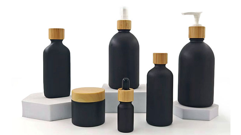 60g 10ml 100ml 250ml Matte black glass lotion essential oil bottle black jar lid cosmetic pump hair care packaging set